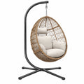 Sillón colgante 105 x 105 x 195 cm de acero y trenzado marrón con asiento beige estilo natural