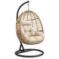 Sillón colgante 105 x 105 x 195 cm de fibra trenzada beige y metal negro para interior
